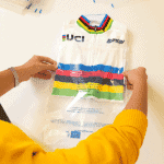 santini white jumper packaged in a sustainable clothing bag