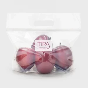 Tipa branded compostable zipper bag filled with red apples