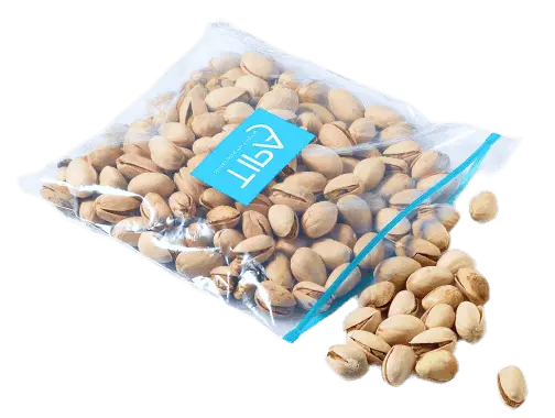 pistachio nuts inside of TIPA branded sustainable packaging