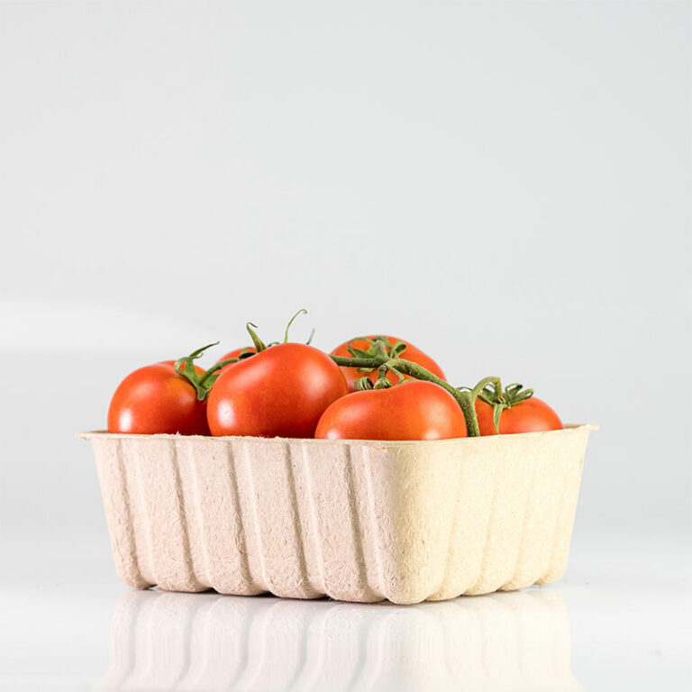 Paddy straw trays filled with tomatoes