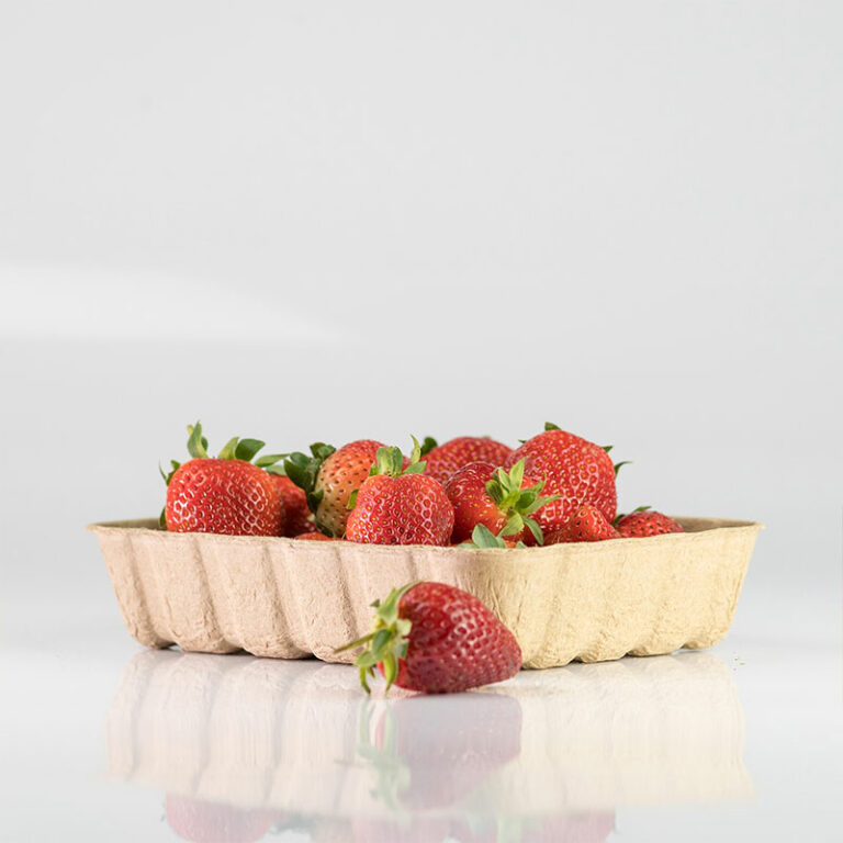 Paddy straw tray filled with strawberries
